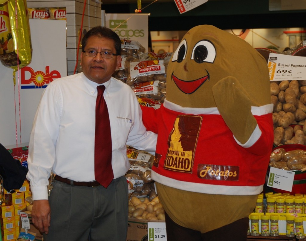 henhousespuddy1 Spuddy Buddy, with a Hen House representative, greeted shoppers during the store's Potato Lover's Month promotions.